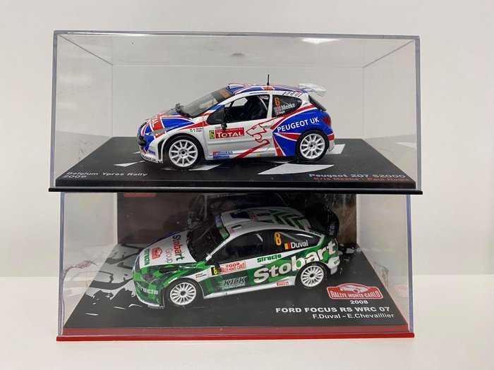 IXO - 1:43 - Peugeot 207 S2000 #6 Ypres Rally 2009 - Meeke/Nagle - + Ford Focus RS WRC 07 # 8 Monte Carlo 2008 - Duval / Chaillier