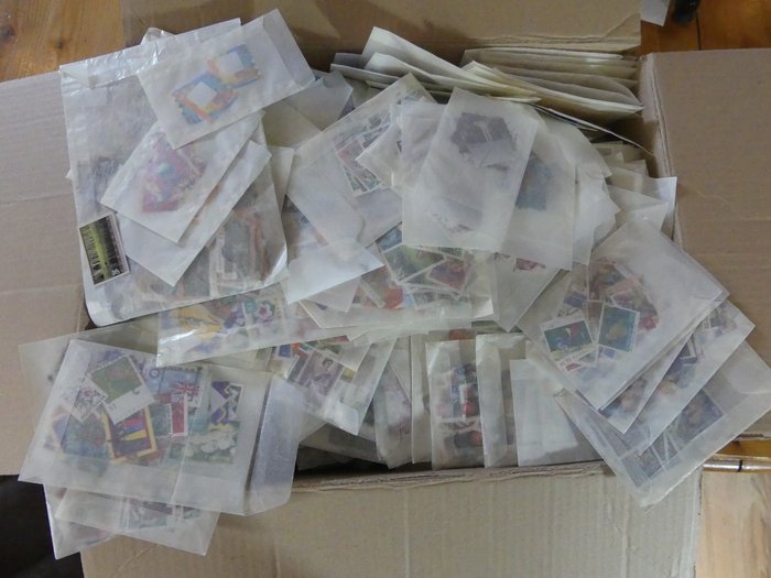 Australia - Large batch of stamps in two boxes and in hundreds of bags
