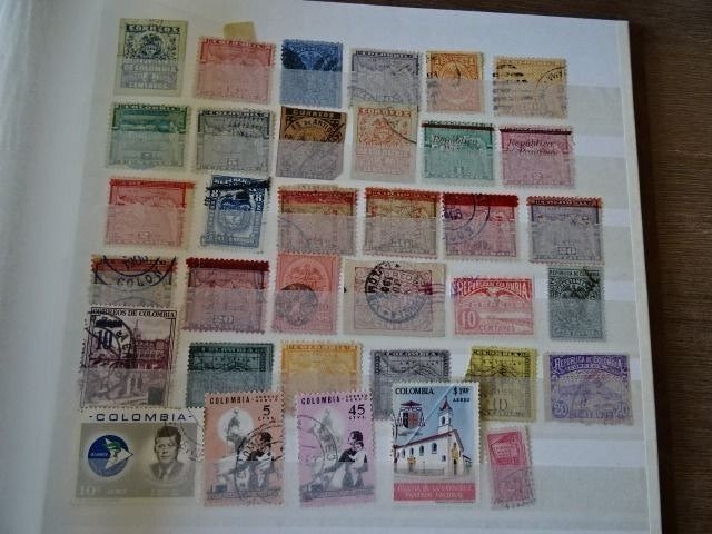 World - Collection in 9 Albums with thousands of Stamps including Africa and South America including Canal