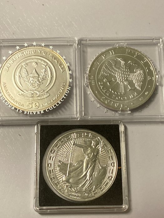 World. 3 Monedas 2010/2019 "Grã-Bretanha, Ruanda e Burundi, Rússia." - 3 x 1 Oz