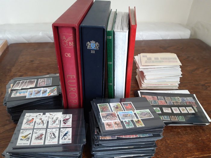 World - Large batch, thousands of stamps on card and in albums + loose stamps.
