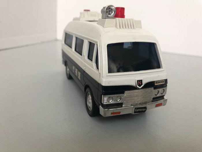 Yonezawa - 1:43 - Nissan - Datsun  Caravan Urvan Politiebus