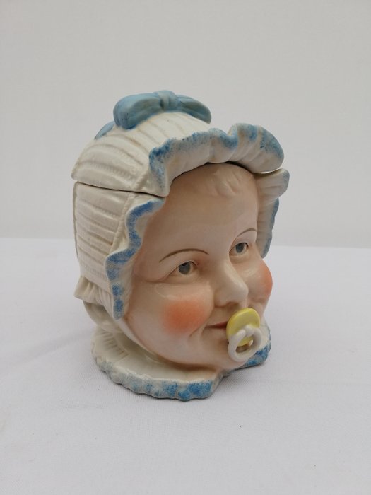 Scultura, testa di bambino - Terracotta