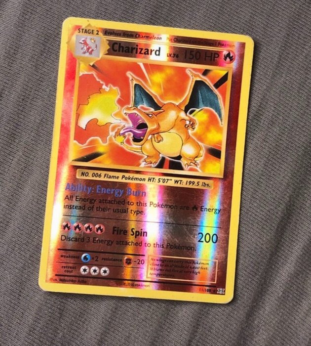 pokemon - Pokémon - Trading card Charizard english lv.76 150HP - 2016