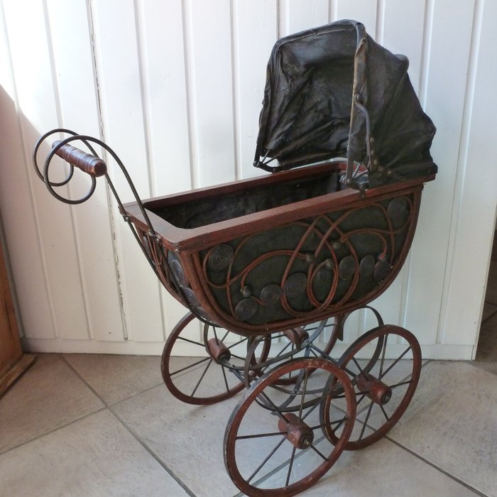 Old doll pram for the doll collector - wood, iron, rattan and wood