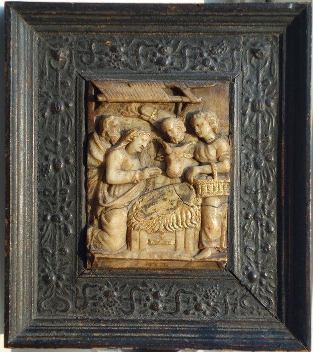 Relief, Krippe - Malines (Mechelen) - Alabaster, in einem Rahmen aus ebonisierter Eiche - Anfang des 17. Jahrhunderts