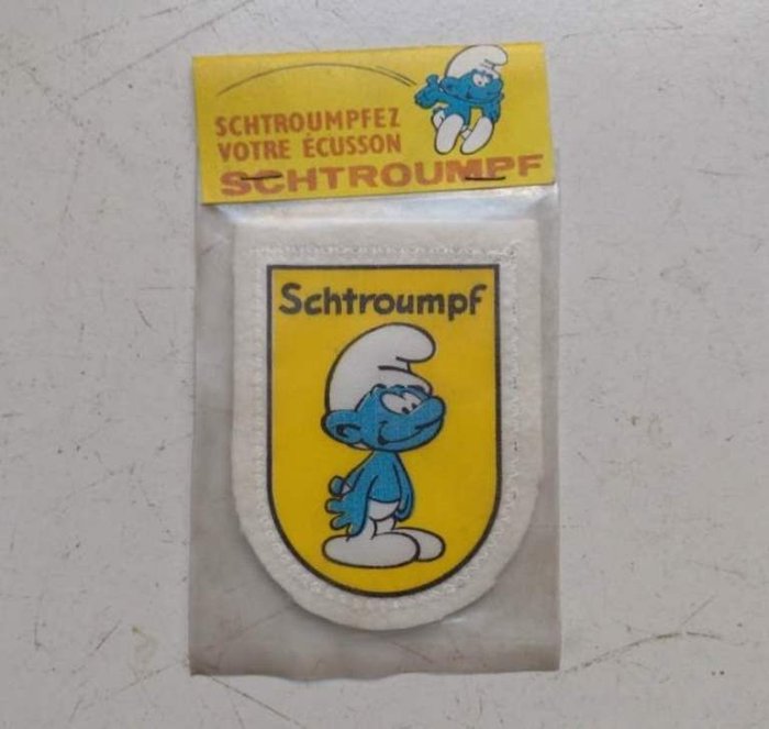 Les Schtroumpfs - Ecussson à coudre en feutrine dans son emballage d'origine - Schtroumpf ordinaire - (Années 60)