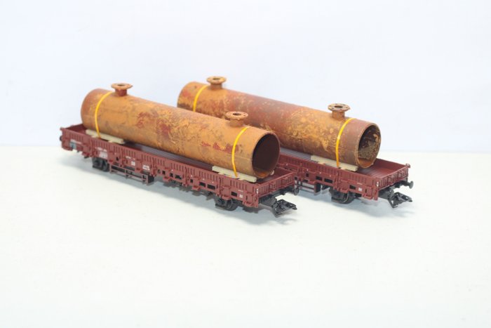 Märklin H0 - 46924 - Freight carriage - 2 stake carriage Rlmms58 loaded with tube - DB