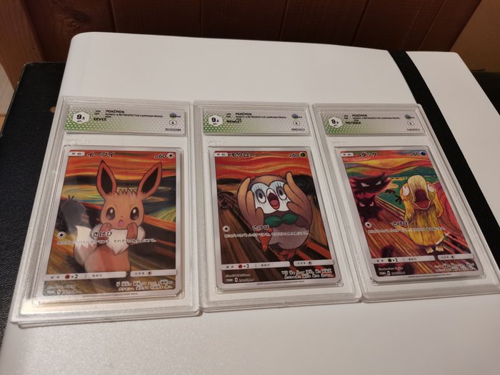 The Pokémon Company - Graded Card Eevee, Rowlet et Psyduck Munch Graad 9,5 mint