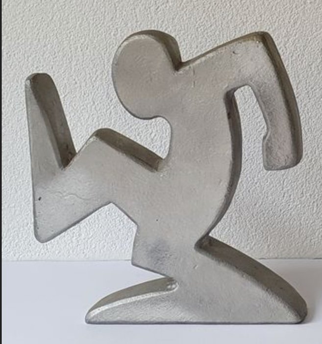 Preview of the first image of la Linea - Bookend, Osvaldo Cavandoli (after Keith Haring), Aluminium - (1975).