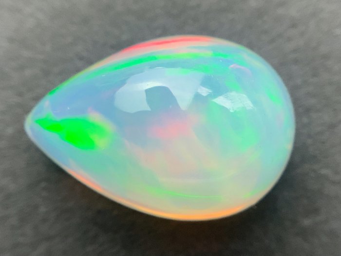 valkoinen-oranssi + värien leikki (eloisa) Opaali kristalli - 3.19 ct