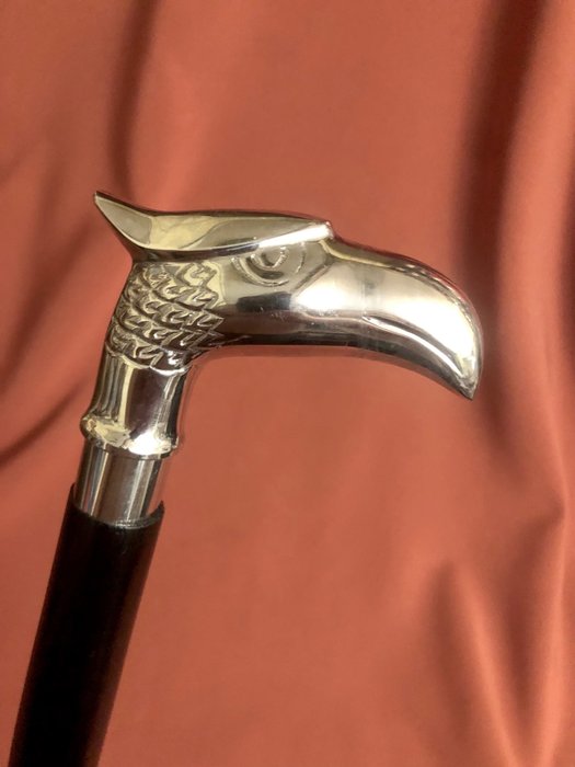 Preview of the first image of A self-defence unusual walking stick. Handle designed as a royal eagle head. - Silvered bronze and.