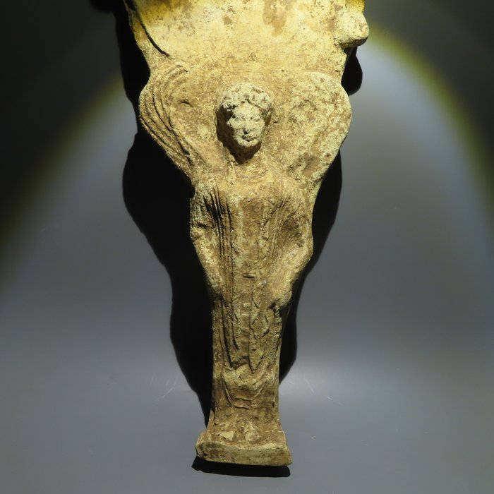 Oldtidens Hellas, mykensk Terrakotta Votivspeil. 5. århundre f.Kr. 37 cm H. - EX. SOTHEBY'S - Spansk eksportlisens.