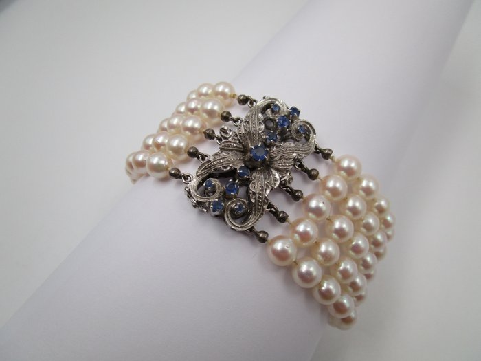 Preview of the first image of 19cm - 5 Reihen Perlenarmband Ø 6.3mm - 18 kt. Akoya pearls, White gold - Bracelet Sapphire - teste.