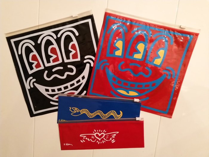 Preview of the first image of Keith Haring (1958-1990) - Keith Haring 3 Eyed Face ziplock bag red and black, 2 pencil cased ziplo.