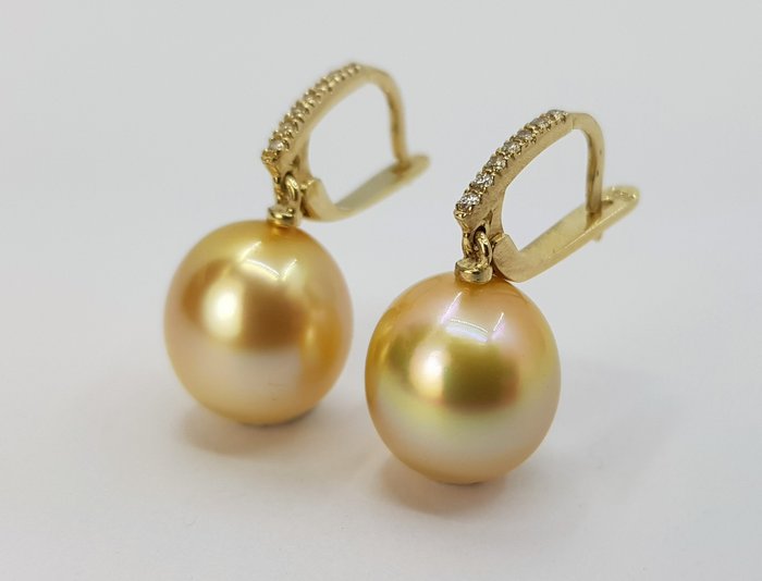 Preview of the first image of 11x12mm Deep Golden South Sea Pearls - 14 kt. Yellow gold - Earrings - 0.11 ct.