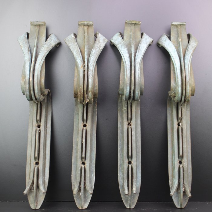 Preview of the first image of Art Deco set of four large curtain rod holders..