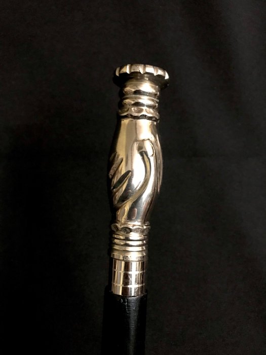 Preview of the first image of An unusual Masonic , ceremonial , walking stick.Handle designed as two intertwined hands - Silvered.