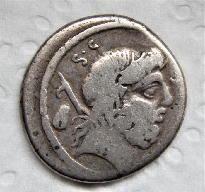 Roman Republic. M. Nonius Sufenas, 57 BC. AR Denarius,  Rome - Roma seated left being crowned by Victory.