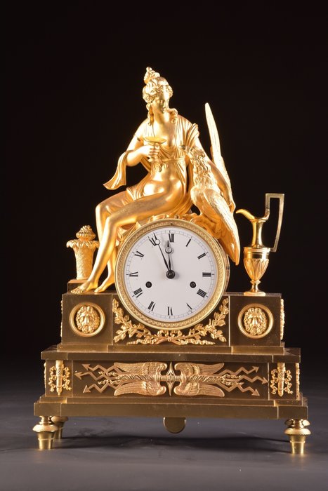 onora l'elegante orologio impero Francia ormolu "Giove" - Impero - Bronzo dorato - Inizio XIX secolo