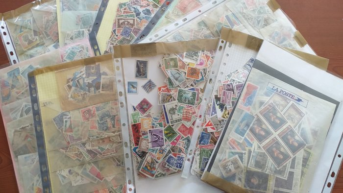 Monde 1900/1985 - un lot de plus de 10000 timbres obliteres , plus de 1 KG de timbres sans papier