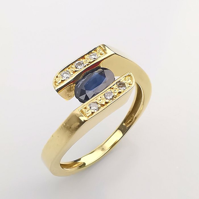 Preview of the first image of 18 kt. Yellow gold - Ring - 0.70 ct Sapphire - Diamonds.