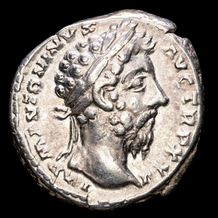 Roman Empire. Marcus Aurelius (AD 161-180). AR Denarius,  Rome 170-171 A.D. -  PRIMI DECENNALES COS III. Legend in 4 lines within wreath.