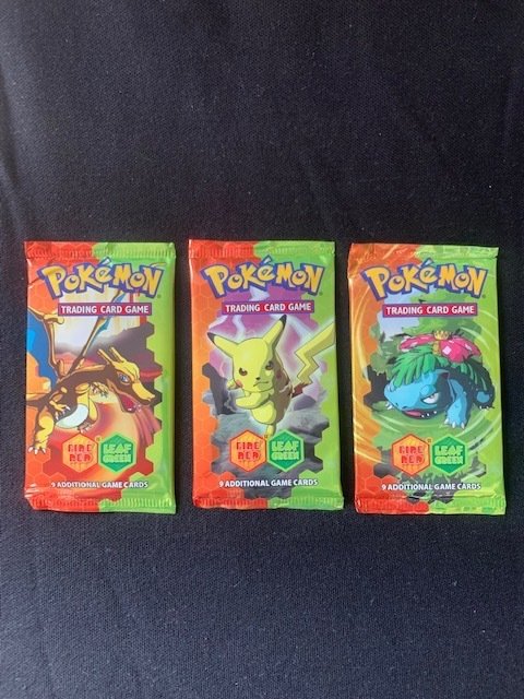 The Pokémon Company - A set of 3 POKEMON Fire Red Leaf Green boosters in English ! Sealed, genuine and in mint condition !