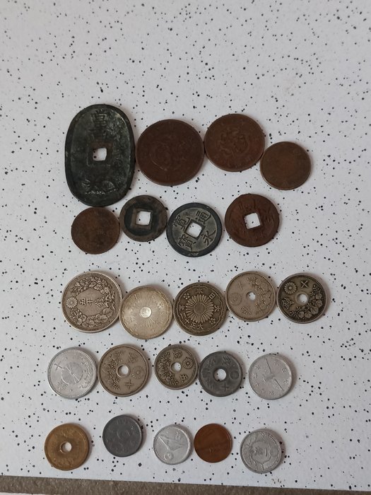Japan. Lot comprising 23 coins. various years (18-20th centuries) some silver coins