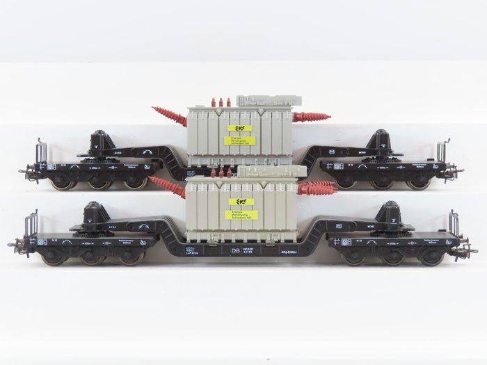 Märklin H0 - 4617 - Freight carriage - 2 six-axle low loader wagon SSI 53, with 'EVS' transformer - DB