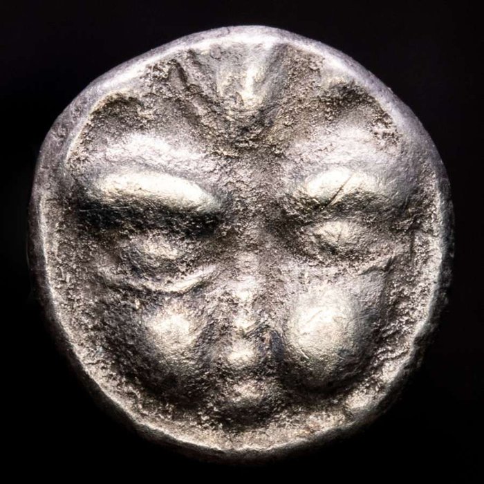 Bruttium, Rhegion, Greece. AR Litra,  ca. 415-387 BC. - Lion front head /  PH within olive branch.
