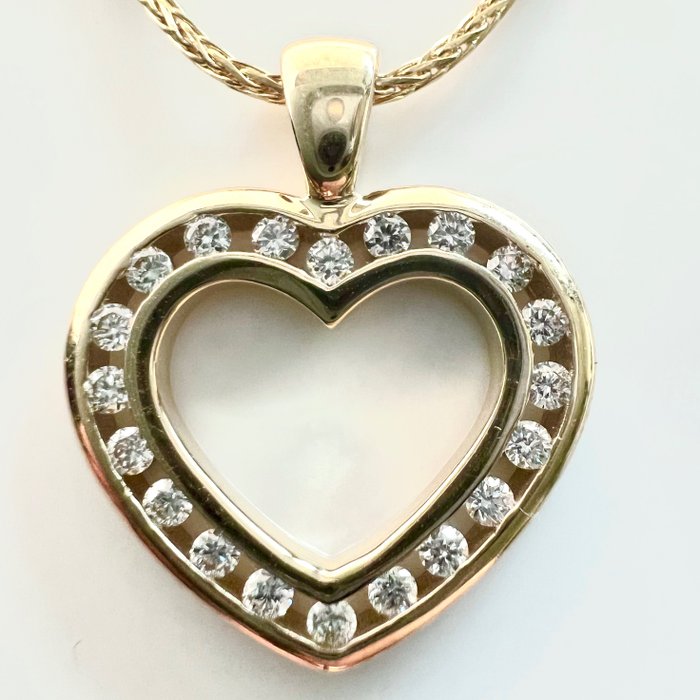 Preview of the first image of Moncara - Herz-Anhänger - 14 kt. Yellow gold - Necklace with pendant - 0.40 ct Diamond - brilliant.