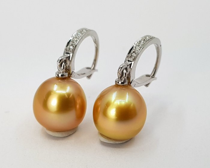 Preview of the first image of 9x10mm Deep Golden South Sea Pearls - 14 kt. White gold - Earrings - 0.09 ct.