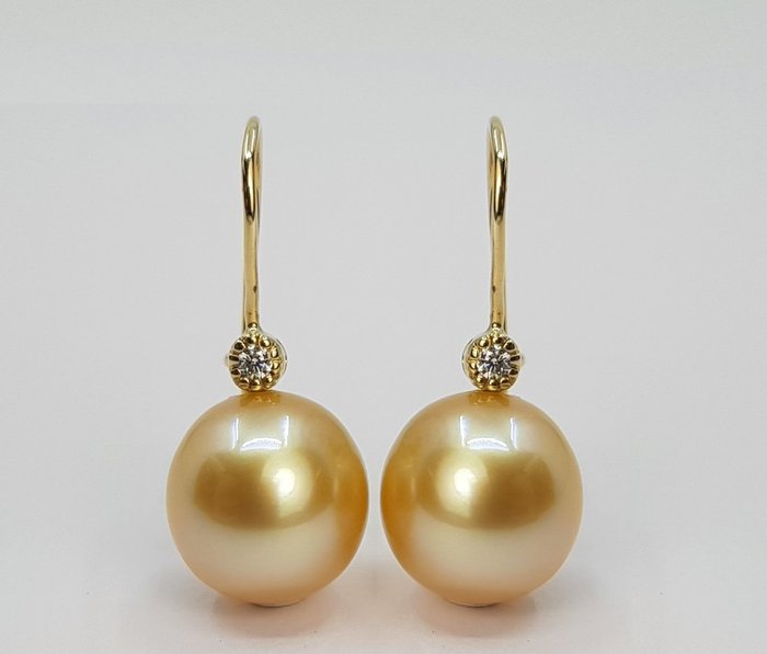Preview of the first image of 11mm Golden South Sea Pearls - 14 kt. Yellow gold - Earrings - 0.04 ct.