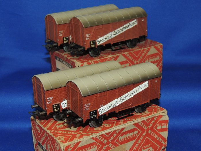 Preview of the first image of Märklin H0 - 306/2 / 4507.1 - Freight carriage - 4x freight cars "General cargo express traffic".
