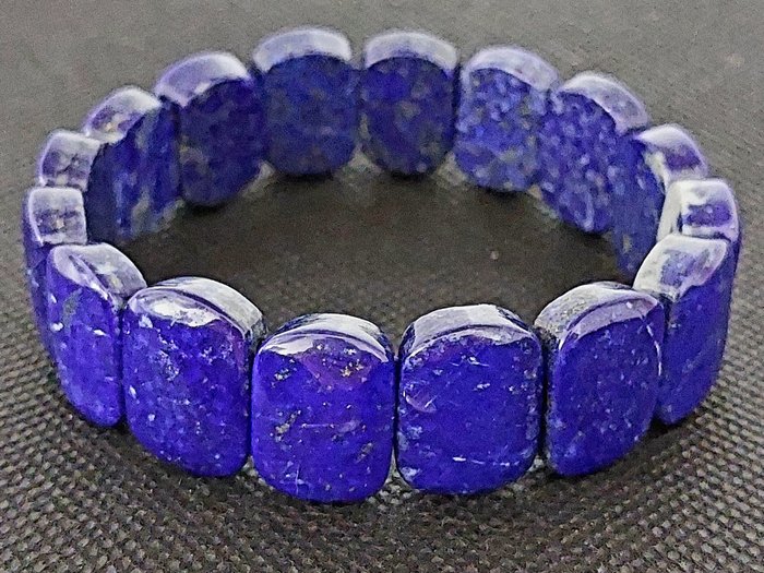 Piękna bransoletka z królewskiego lapis lazuli, pochodząca z Afganistanu. Jakość AAA. Bardzo piękny kolor. - Wysokość: 2 cm - Szerokość: 0.5 cm- 50 g - (1)