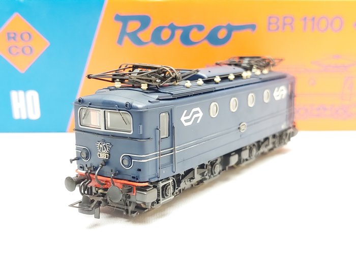 Roco H0 - 04157B - Locomotiva elettrica (1) - Serie 1100, blu con loghi NS - NS