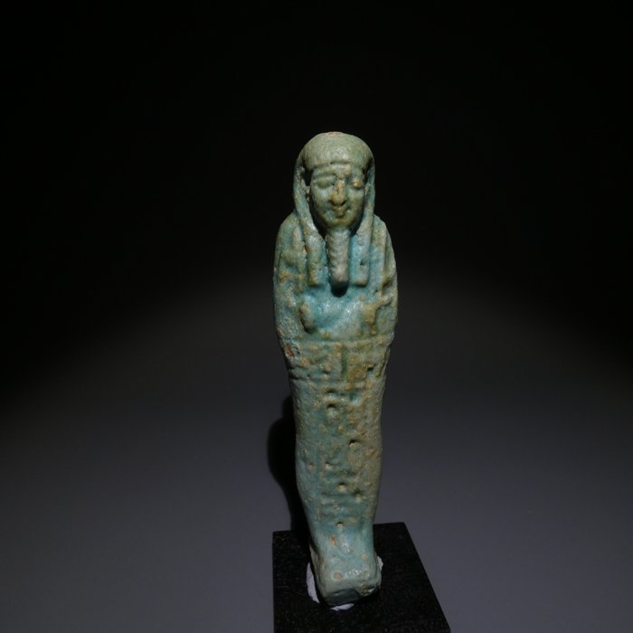 古埃及 Faience, 乌沙布提。高 11.1 厘米。古埃及晚期，公元前 664 - 323 年 玩具人偶