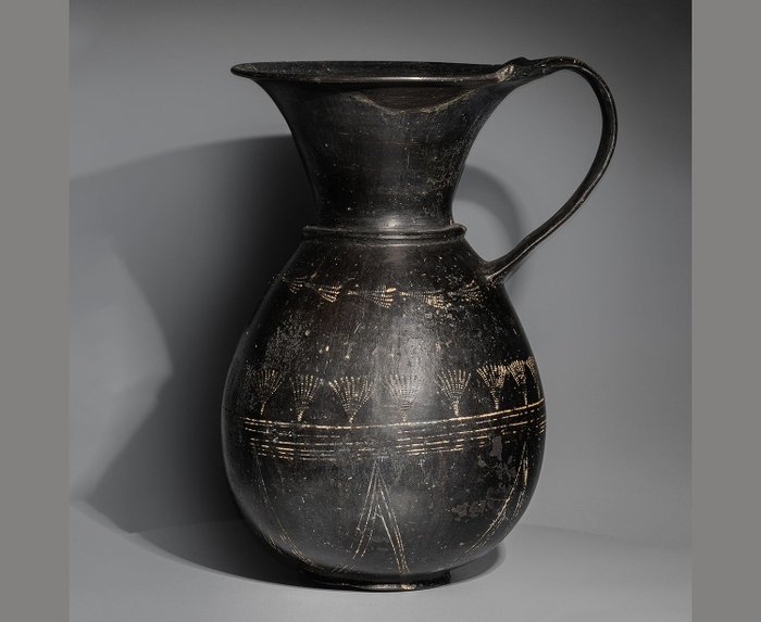 Etruskiska Keramik Olpe i Bucchero. 6:e - 5:e århundradet f.Kr. 22 cm H.
