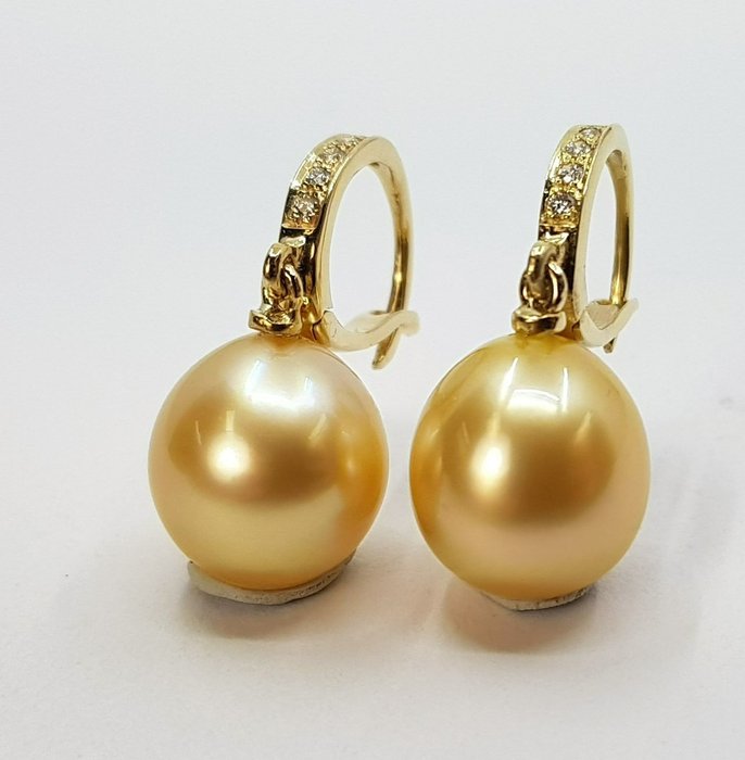 Preview of the first image of 10x11mm Deep Golden South Sea Pearls - 14 kt. Yellow gold - Earrings - 0.09 ct.