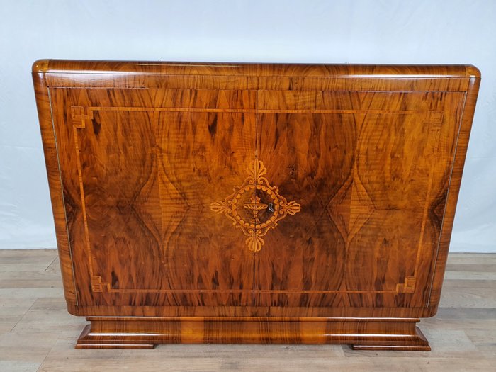 Preview of the first image of Art Deco sideboard threaded in walnut.