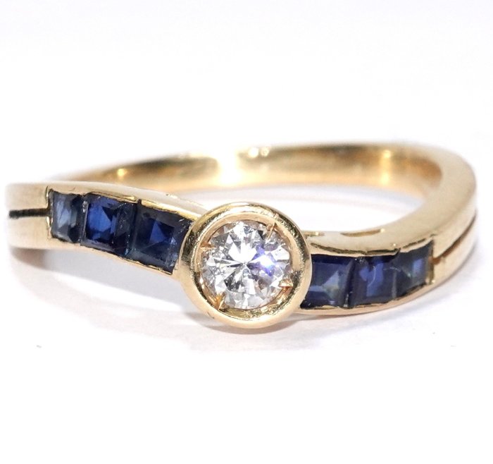 Preview of the first image of 18 kt. Yellow gold - Ring - 0.30 ct Diamond - Sapphires.