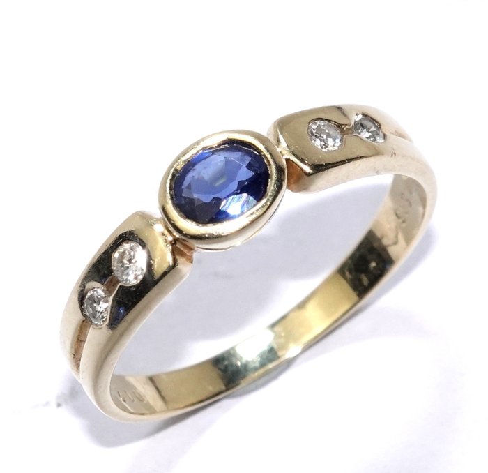 Preview of the first image of 14 kt. Yellow gold - Ring - 0.40 ct Sapphire - Diamonds.