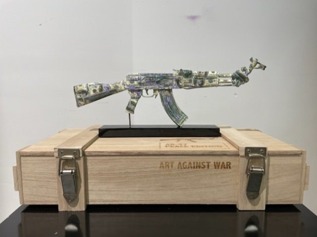 Preview of the first image of Van Apple - Art Against War - Dollar Amex AK-47.