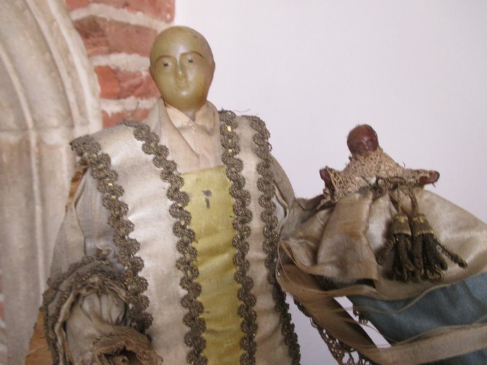 Preview of the first image of 19th century religious statue St Antoine de Padoue in wax with finish in - wax, silk and brocade -.