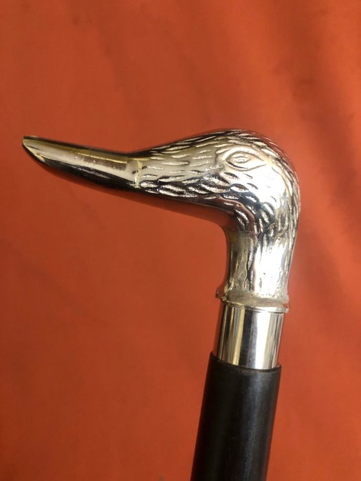 Walking stick - A hunting , self defence , duck walking stick. Handle designed as a duck’s head, in silvered brass - silvered brass and black wood