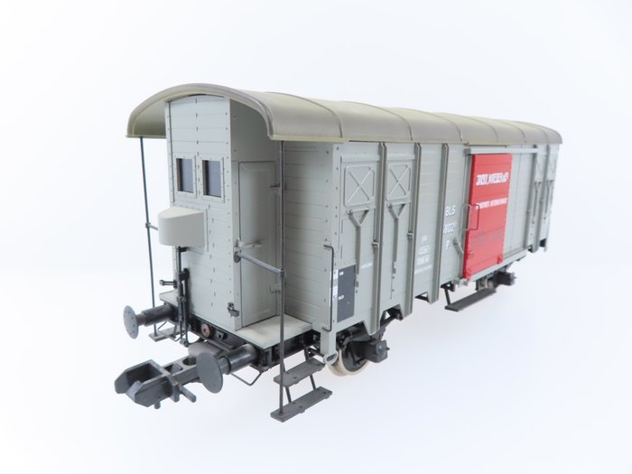 Preview of the first image of Märklin 1 - 5506 - Freight carriage - 2-axle boxcar with balcony and "Jacky, Maeder & Cie" imprint.