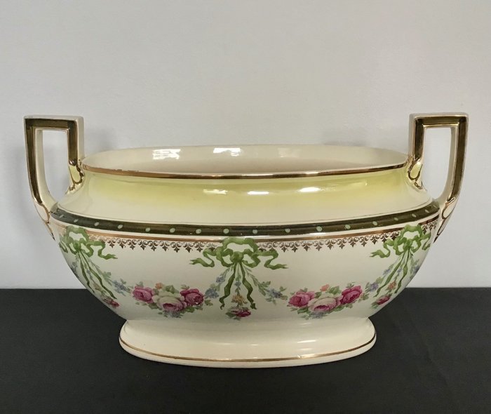 Preview of the first image of Imposing Art Deco jardinière with colorful floral decoration.