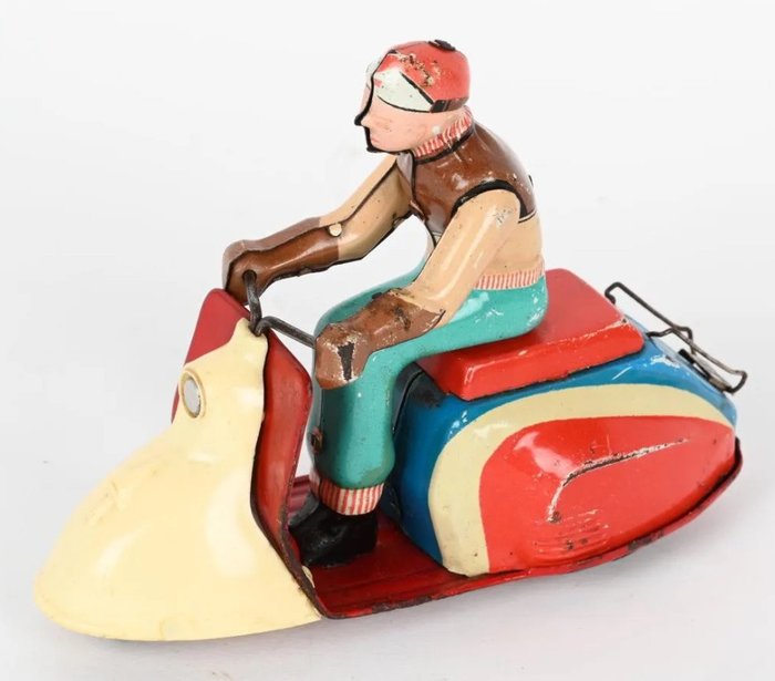 Preview of the first image of Jouet de fabrication Allemande - mechanical scooter Scooter Lambretta et son pilote - 1950-1959 - G.