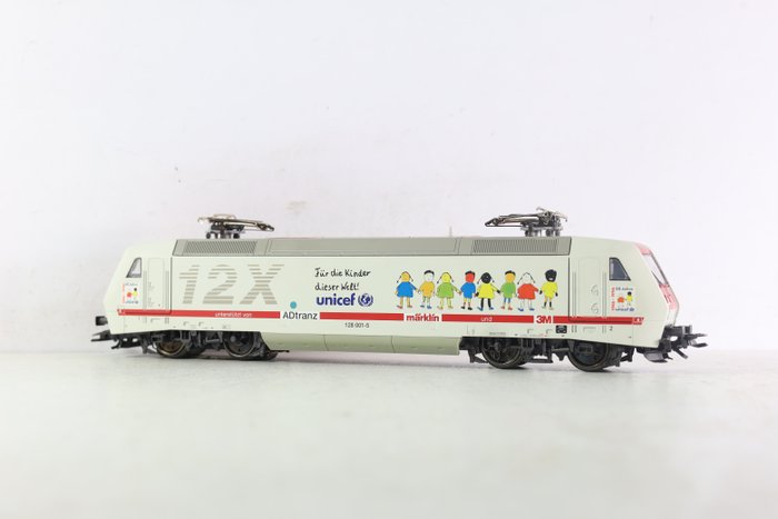 Preview of the first image of Märklin H0 - 37382 - Electric locomotive - BR 128 "12X" Unicef - DB.